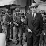 General Edwin Walker being arrested for inciting a riot. He was placed in an army hospital for psychiatric evaluation.